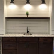finished basement with a wet bar - South Metro Custom Remodeling basement contractor