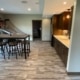finished basement with basketball game and dining table - South Metro Custom Remodeling basement contractor