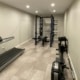finished basement with a home gym - South Metro Custom Remodeling unfinished basement